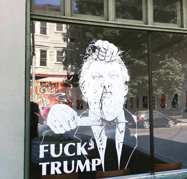democrat - mural cutting Trumps throat